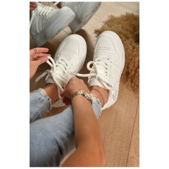 Кросівки жіночі білого кольору на шнурівці 172484L