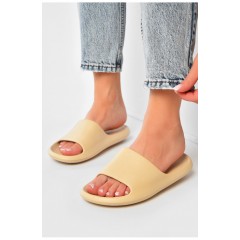 Шльопанці піна жіночі бежевого кольору 203725L