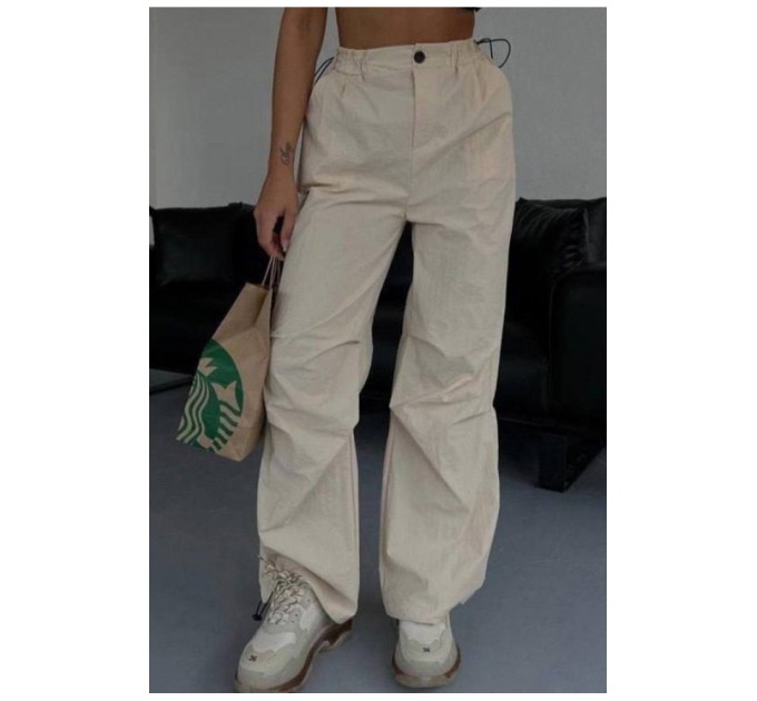 Спортивні штани жіночі бежевого кольору 173332L