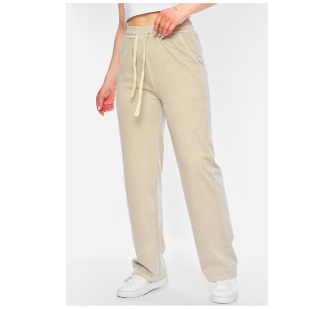 Штани жіночі розкльошені бежевого кольору 198431L