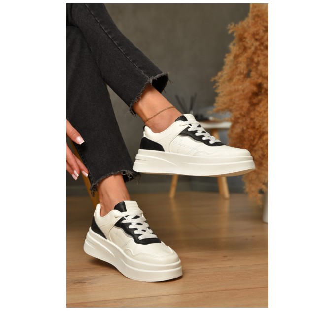 Кросівки жіночі білого кольору на шнурівці 206094L