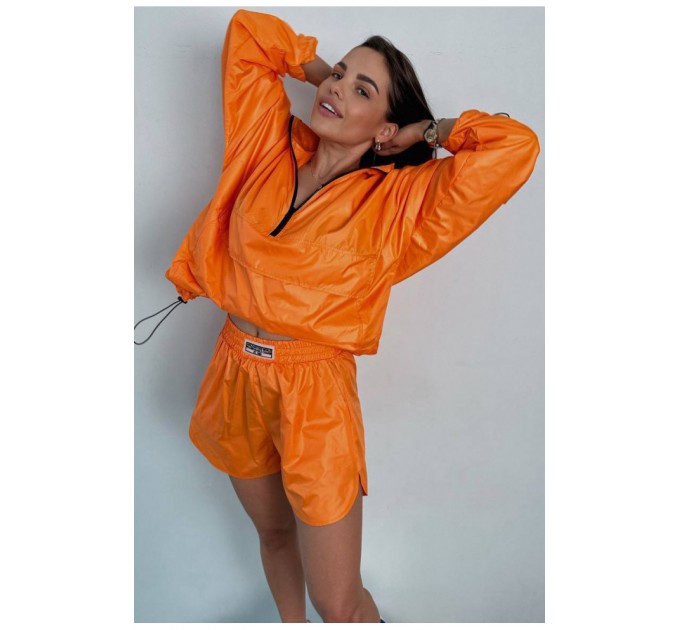 Анорак жіночий помаранчевого кольору 184254L