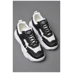Кросівки чоловічі чорно-білого кольору на шнурівці 177373L Кросівки чоловічі чорно-білого кольору на шнурівці 177373L