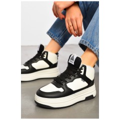 Кросівки жіночі зимові чорно-білого кольору на шнурівці 195202L