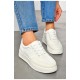 Кросівки жіночі білого кольору на шнурівці 201025L