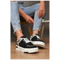 Кросівки жіночі чорного кольору на шнурівці 174400L