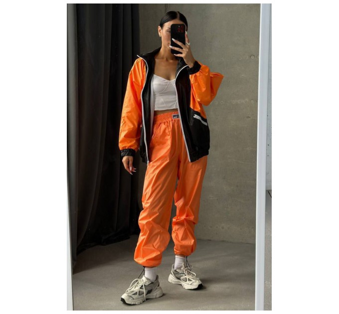 Вітрівка жіноча помаранчевого кольору 184242L