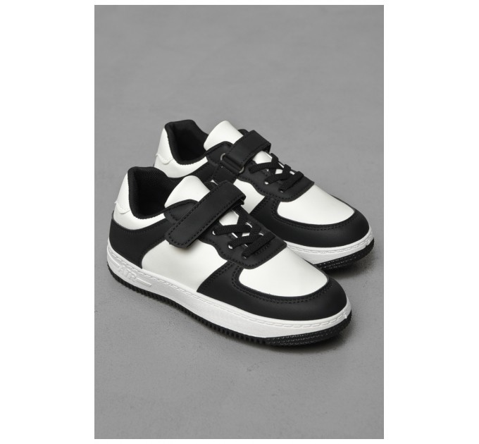 Кросівки дитячі чорно-білого кольору на шнурівці 190147L