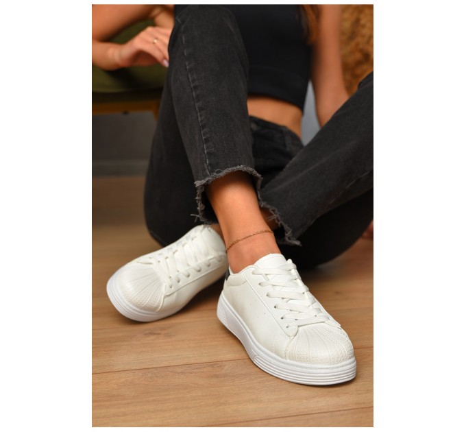 Кросівки жіночі білого кольору на шнурівці 205772L