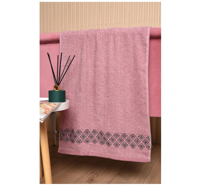 Рушник для обличчя махровий рожевого кольору 173457L