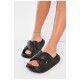 Шльопанці піна жіночі чорного кольору 174042L