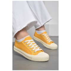Кеди жіночі текстильні жовтого кольору на шнурівці 178896L