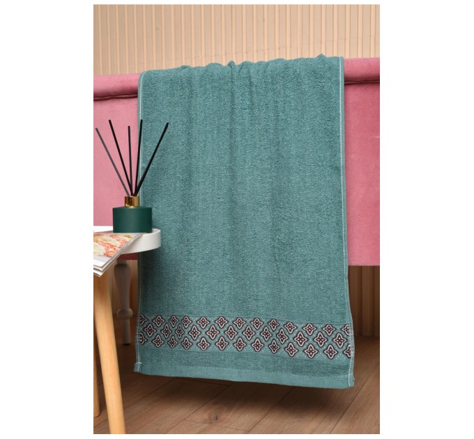 Рушник для обличчя махровий зеленого кольору 173467L