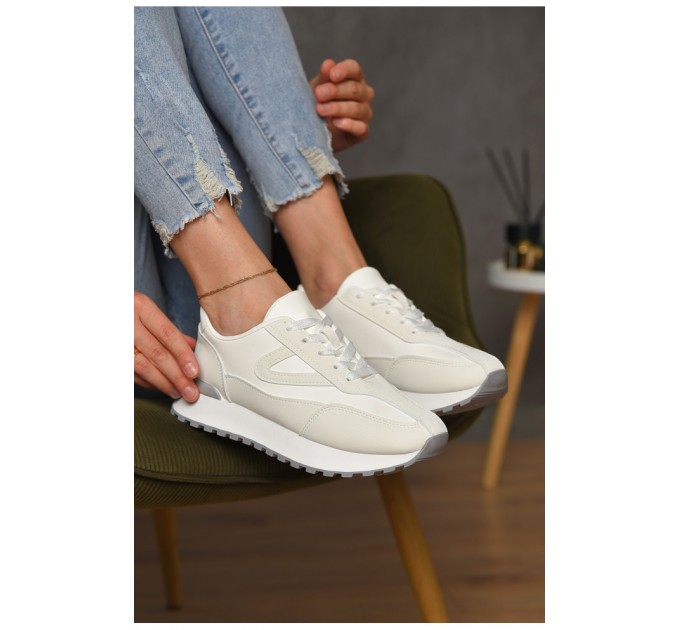 Кросівки жіночі білого кольору на шнурівці 178387L