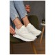 Кросівки жіночі білого кольору на шнурівці 178387L