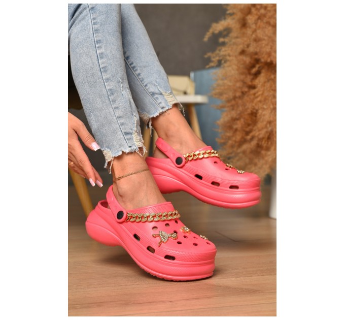 Крокси жіночі рожевого кольору 178538L