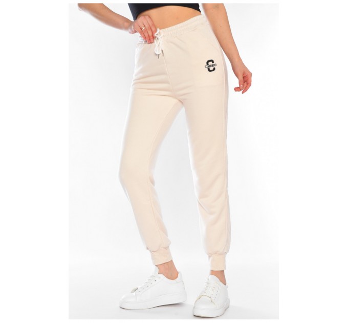 Спортивні штани жіночі молочного кольору 178604L