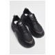 Кросівки чоловічі чорного кольору на шнурівці 177363L