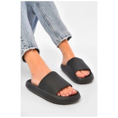 Шльопанці піна жіночі чорного кольору 203940L