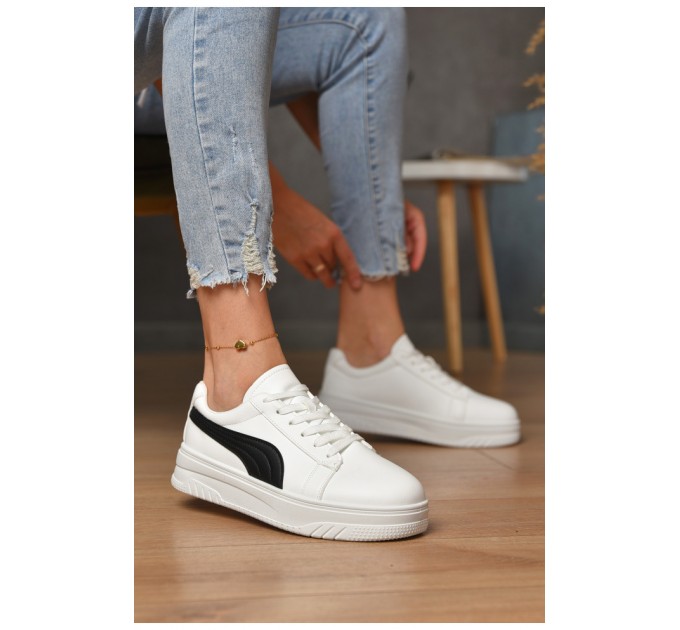 Кросівки жіночі біло-чорного кольору на шнурівці 177028L