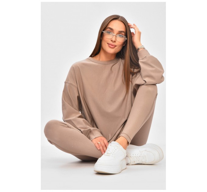 Костюм жіночий однотонний бежевого кольору. 205769L