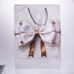 Подарунковий пакет з бантом 30*12*42 см 12 штук в упаковці