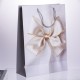 Подарунковий пакет з бантом 30*12*42 см 12 штук в упаковці