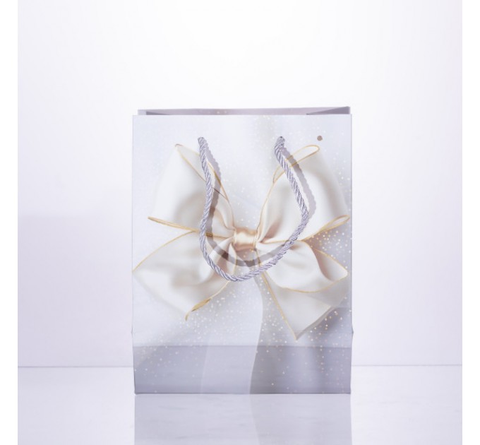 Подарочный пакет с бантом 18*10*22.5 см. 12 штук в упаковке.