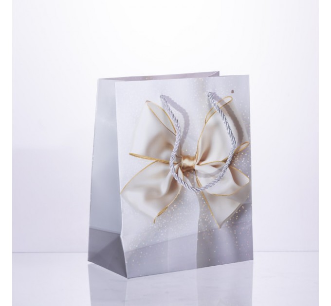 Подарочный пакет с бантом 18*10*22.5 см. 12 штук в упаковке.