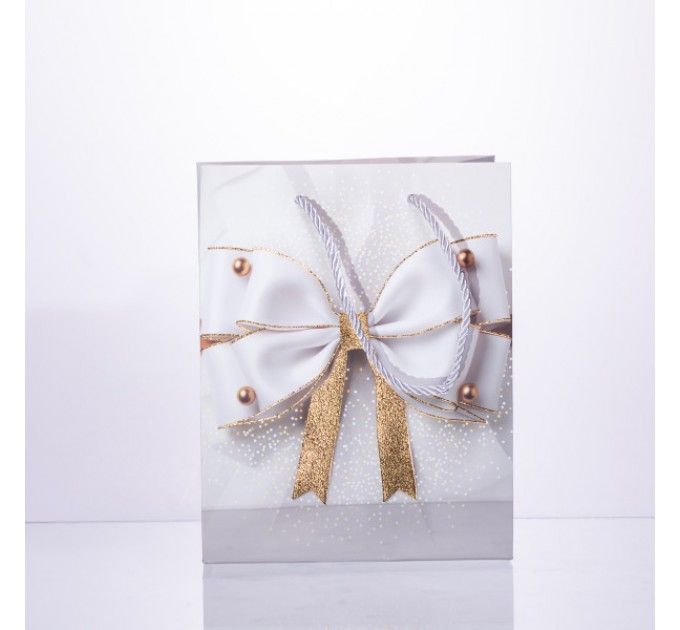 Подарочный пакет с бантом 18*10*22.5 см. 12 штук в упаковке.