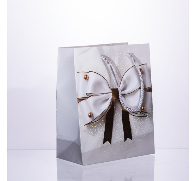 Подарочный пакет с бантом 18*10*22.5 см. 12 штук в упаковке.