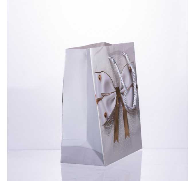Подарочный пакет с бантом 18*10*22.5 см. 12 штук в упаковке.