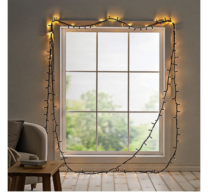 Гірлянда Нитка 220 LED 22 м чорна, жовтий