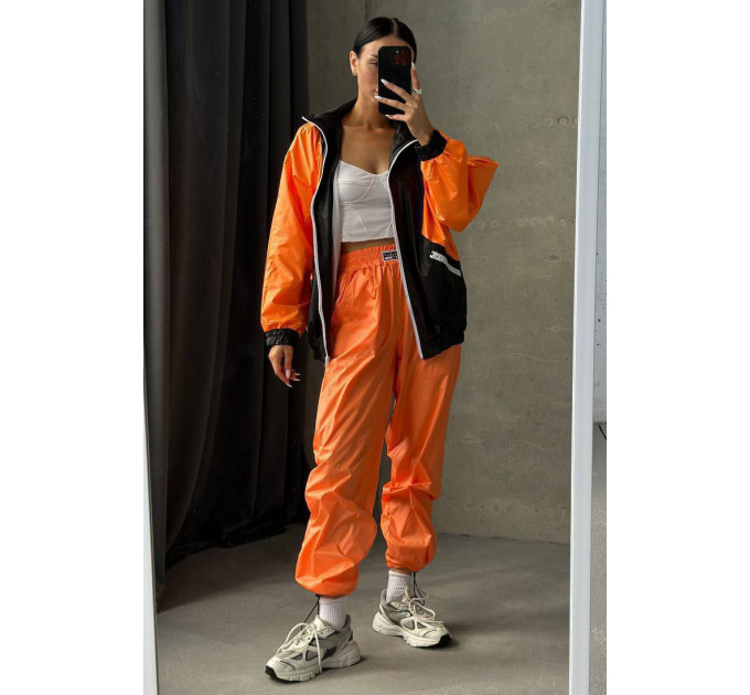 Вітрівка жіноча помаранчевого кольору Fashion 126 42-44 Помаранчевий (184242)